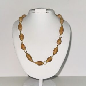 Tan Bead necklace connected with gold fixings on a white form with a neutral background