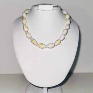 Short necklace of white paper beads with bright yellow markings