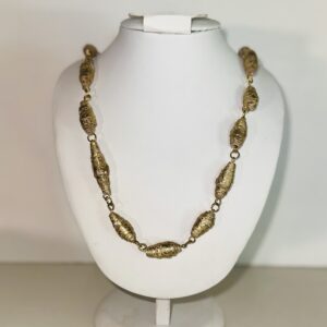 Gold foil paper beads in long chain necklace
