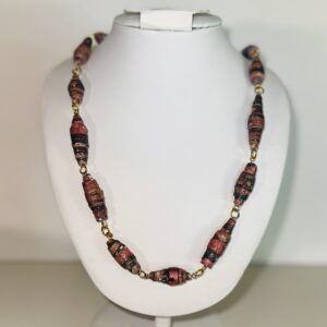 Long chain necklace made of red and black stripe textured paper beads.