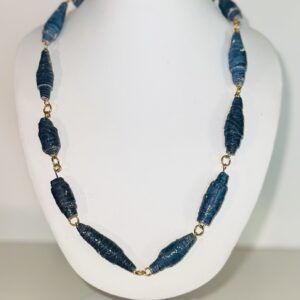 Long chain necklace of dark gray almost black paper beads with gold fixings.