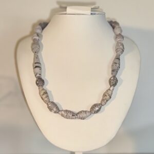 Silver and Grays Necklace on a white necklace form with a neutral background