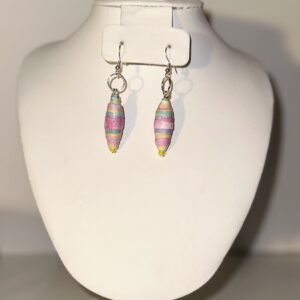 Rainbow earrings with yellow seed beads with silver metal fixings on a neutral background
