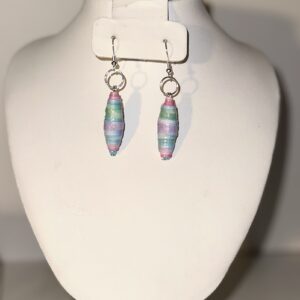 Rainbow earrings with blue seed beads with silver metal fixings on a neutral background