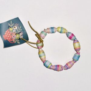 Pastel Rainbow bracelet with saturated colors on a neutral background