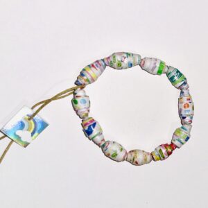 Rainbow Garden Bracelet with flowers, polka dots, shapes and bold colors on a neutral brown background