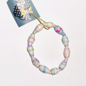 Pastel Rainbow bracelet with saturated colors on a neutral background